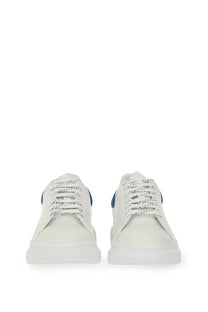 Alexander mcqueen men’s oversized leather sneaker white with navy blue heel tab and perforations along the laces