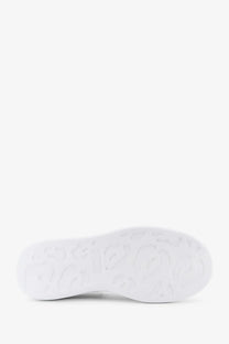 White rubber sole with embossed leopard print pattern on Alexander McQueen men’s oversized black leather sneakers