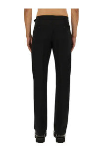 Alexander mcqueen men’s black tailored trousers with a sleek straight-leg cut and subtle front pockets
