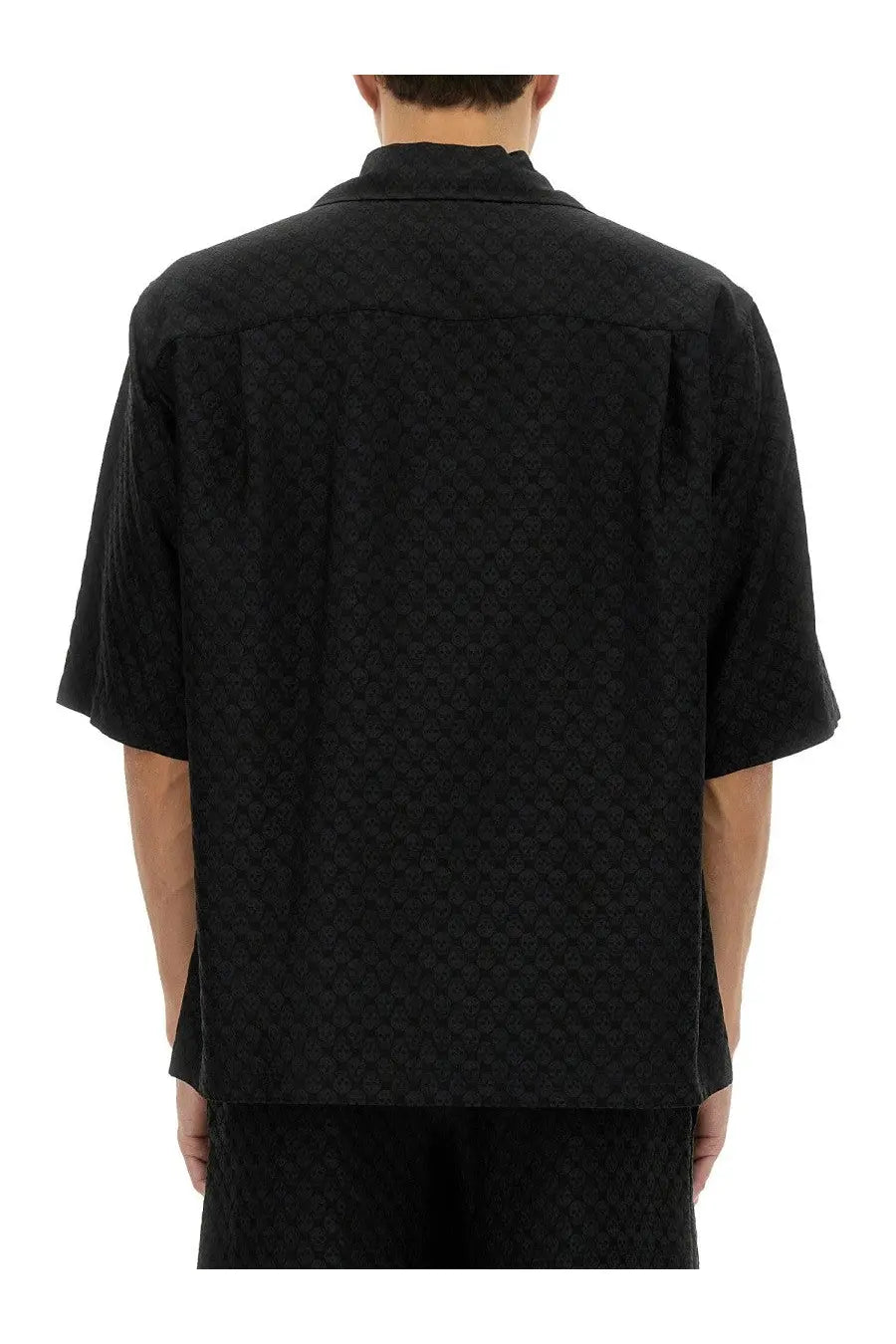 Alexander McQueen men’s black short-sleeved shirt with subtle skull textured pattern in lightweight fabric