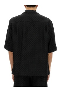 Alexander McQueen men’s black short-sleeved shirt with subtle skull textured pattern in lightweight fabric