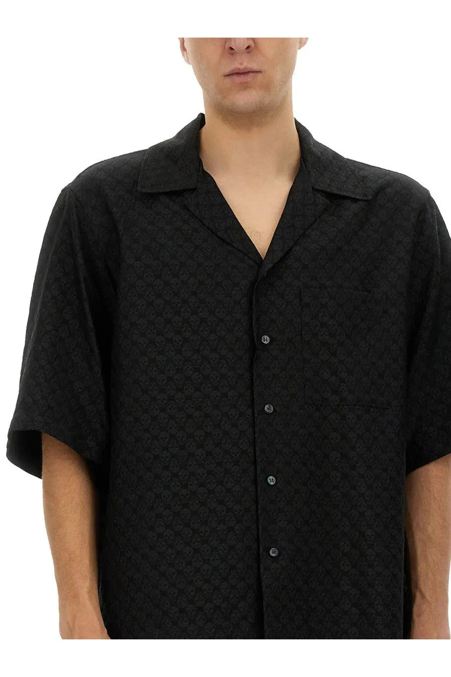 Alexander McQueen men’s black short-sleeved button-up shirt with subtle skull textured pattern for stylish wear