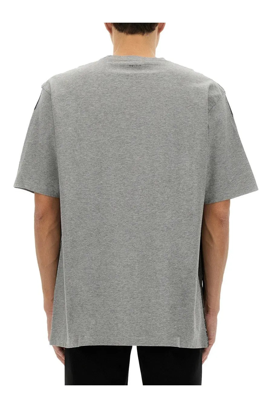 Alexander McQueen men’s gray heathered cotton t-shirt with black side panels and subtle brand tag at neckline