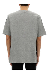 Alexander McQueen men’s gray heathered cotton t-shirt with black side panels and subtle brand tag at neckline
