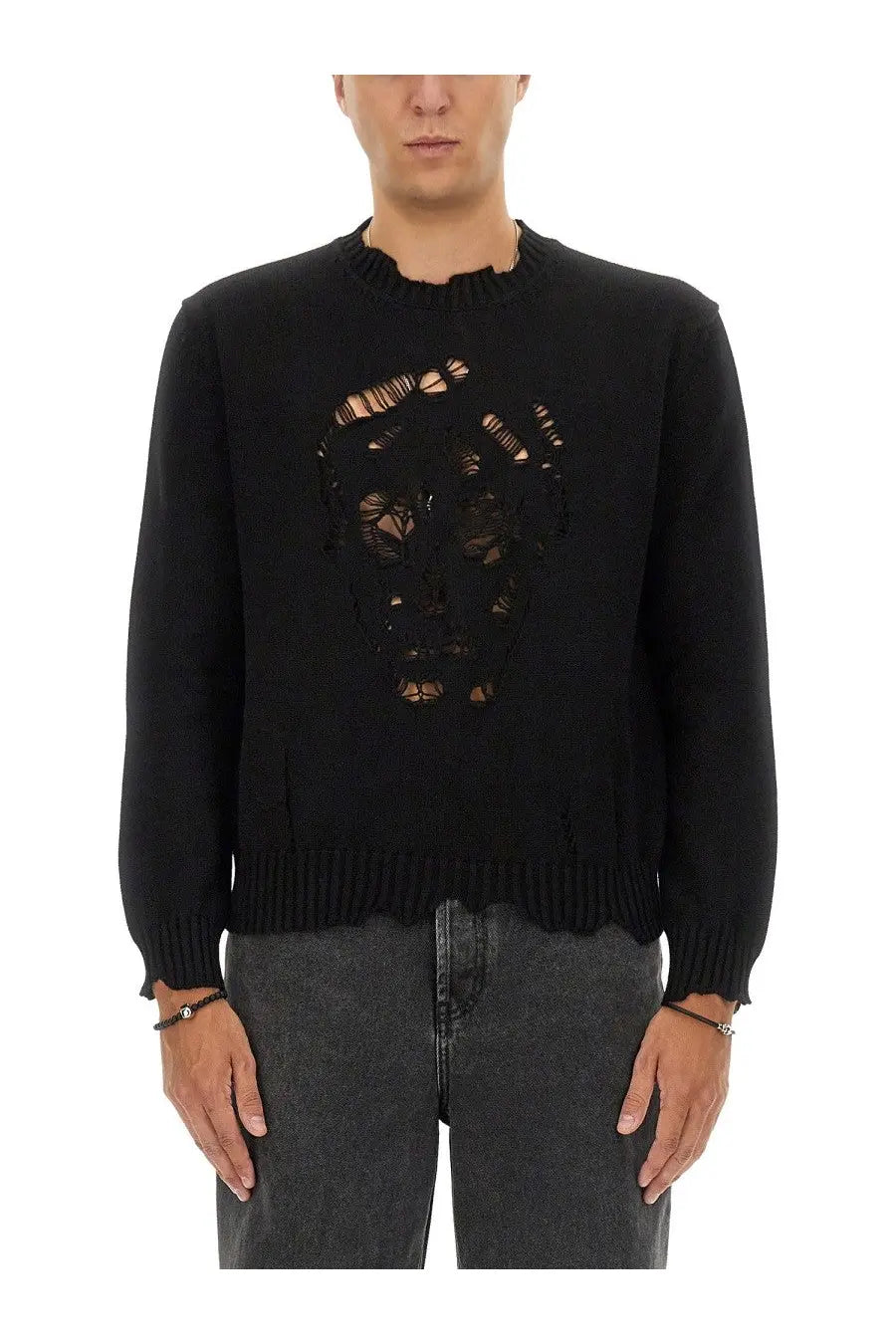Alexander McQueen men’s black knitted sweater with a distressed lace-like skull design on the front