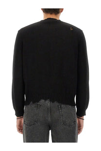 Alexander McQueen men’s black knitted sweater with ribbed hem and subtle distressed shoulder detail