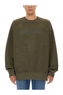 Alexander McQueen men’s olive green oversized crewneck sweatshirt with subtle embossed logo across the chest