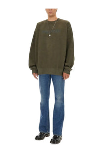 Olive green oversized alexander mcqueen men’s sweatshirt with faded embroidered logo across the chest