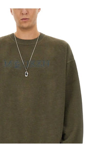 Olive green textured alexander mcqueen men’s sweatshirt with mcqueen logo across the chest