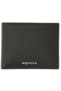 Black leather alexander mcqueen men’s wallet with silver m@queen branding on the front side