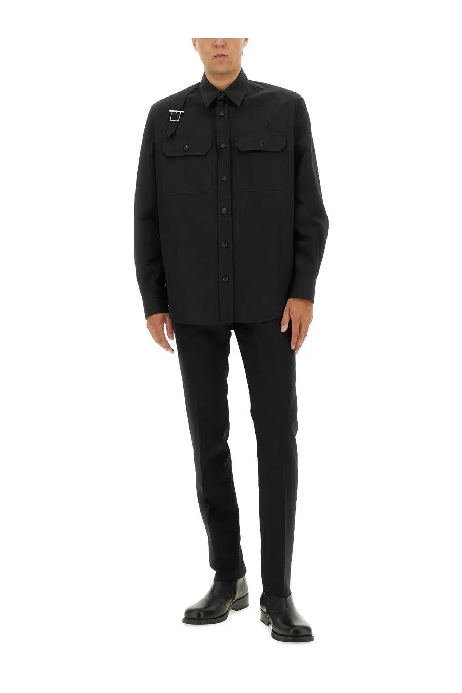 Black long-sleeved wool shirt with two chest pockets and silver logo patch paired with alexander mcqueen wool pants