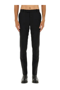 Alexander McQueen men’s black wool tailored trousers with sleek straight-leg cut and subtle front creasing
