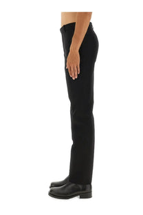 Black tailored wool trousers by Alexander McQueen with a sleek straight-leg cut and subtle stitching details