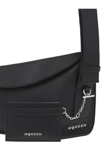 Alexander McQueen women’s black leather crossbody bag with silver-tone hardware and matching cardholder sling