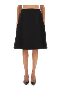 Alexander McQueen women’s black a-line midi skirt with smooth tailored fabric and clean hemline