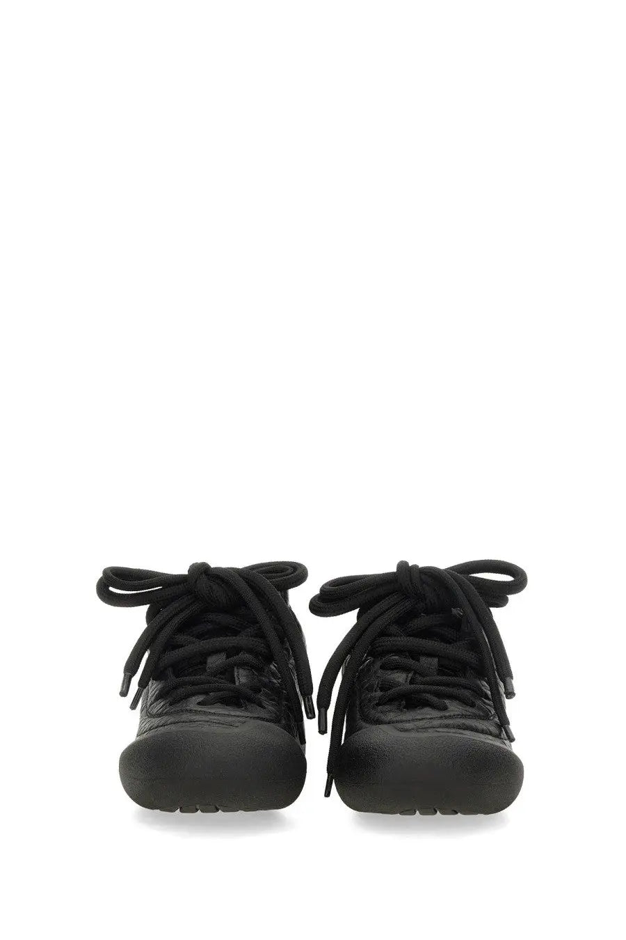 Alexander McQueen women’s Flexion sneaker black with textured upper and matching laces in black Bottega Veneta style