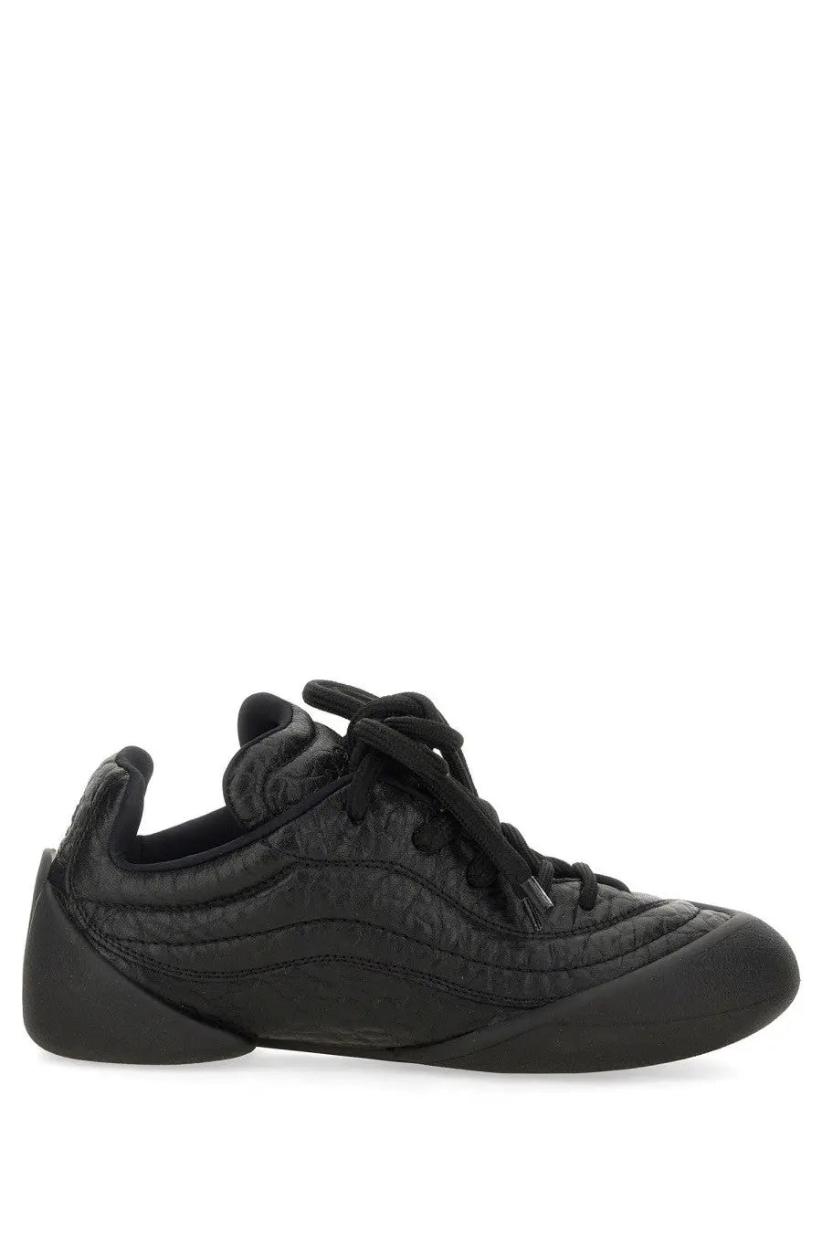 Alexander McQueen women’s flexion sneaker black textured leather with sleek modern design and subtle stitching details