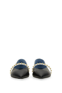 Alexander McQueen women’s leather ballerina black mules with white strap and gold stud detailing visible from the back