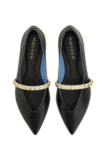 Alexander McQueen women’s black leather ballerina flats with pointed toe and white strap with gold studs