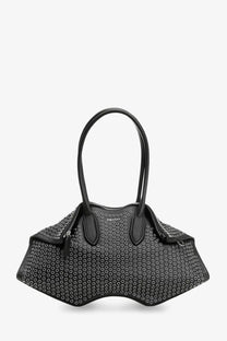 Alexander McQueen women’s black leather shoulder bag with flared silhouette and silver-toned circular studs pattern
