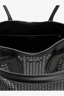 Alexander McQueen women’s manta black leather tote bag with silver-toned circular studs in a grid pattern
