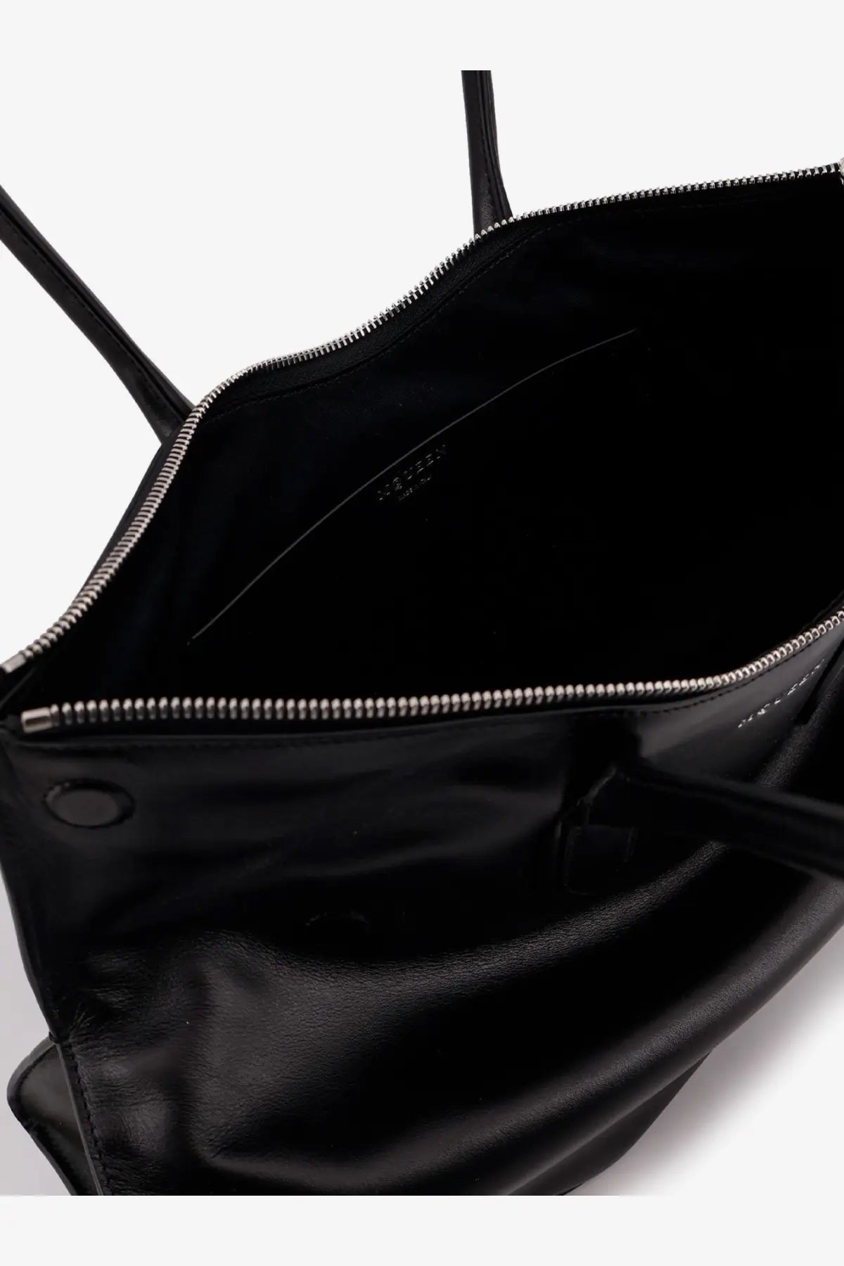 Alexander McQueen women’s manta black leather tote bag with silver zipper and handles for shoulder use