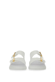 White leather sandals with gold-tone buckle details from Alexander McQueen women’s oversize hybrid sandal collection