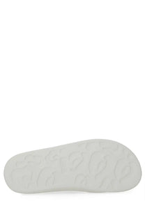 White rubber sole with embossed leopard print pattern on alexander mcqueen women’s oversize hybrid sandal white