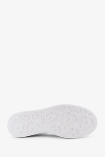 White rubber sole with embossed logo pattern on alexander mcqueen women’s oversize blue leather sneakers