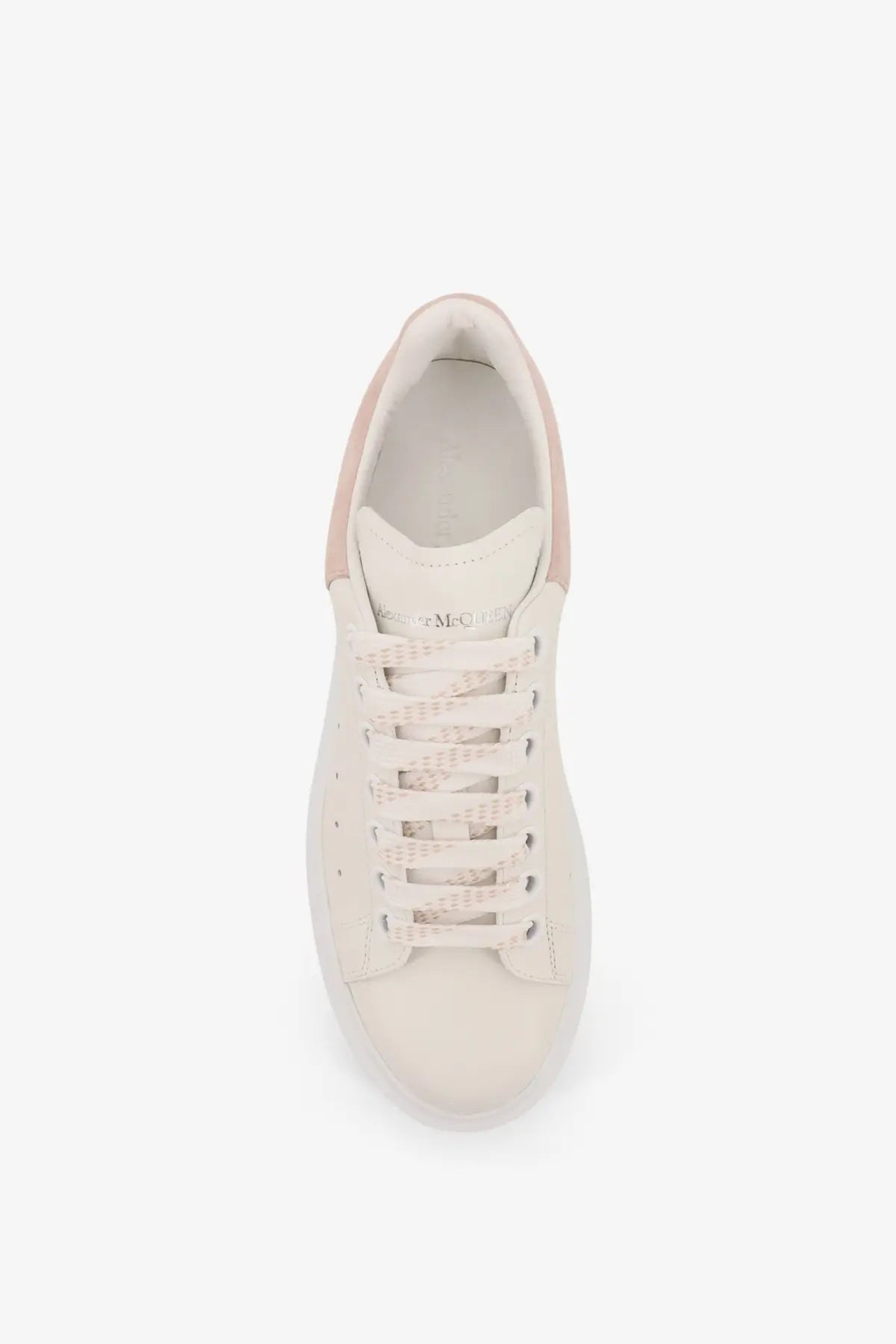 Alexander McQueen women’s cream suede oversized sneaker with pink accents on heel and tongue minimalist design