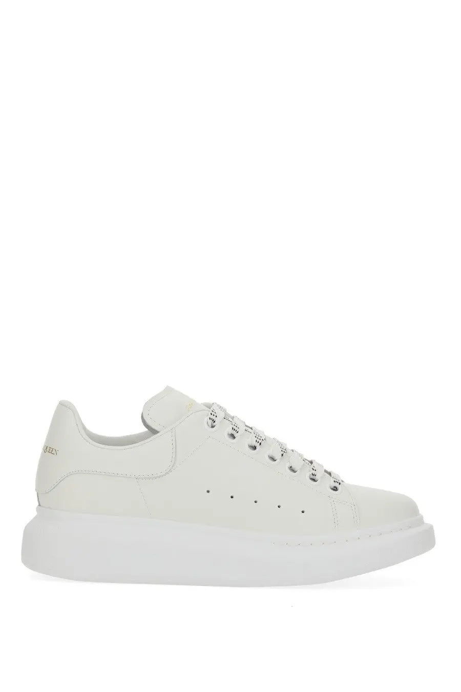 Alexander McQueen women’s oversized sneaker in white leather with chunky sole and subtle side perforations