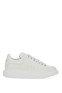 Alexander McQueen women’s oversized sneaker in white leather with chunky sole and subtle side perforations