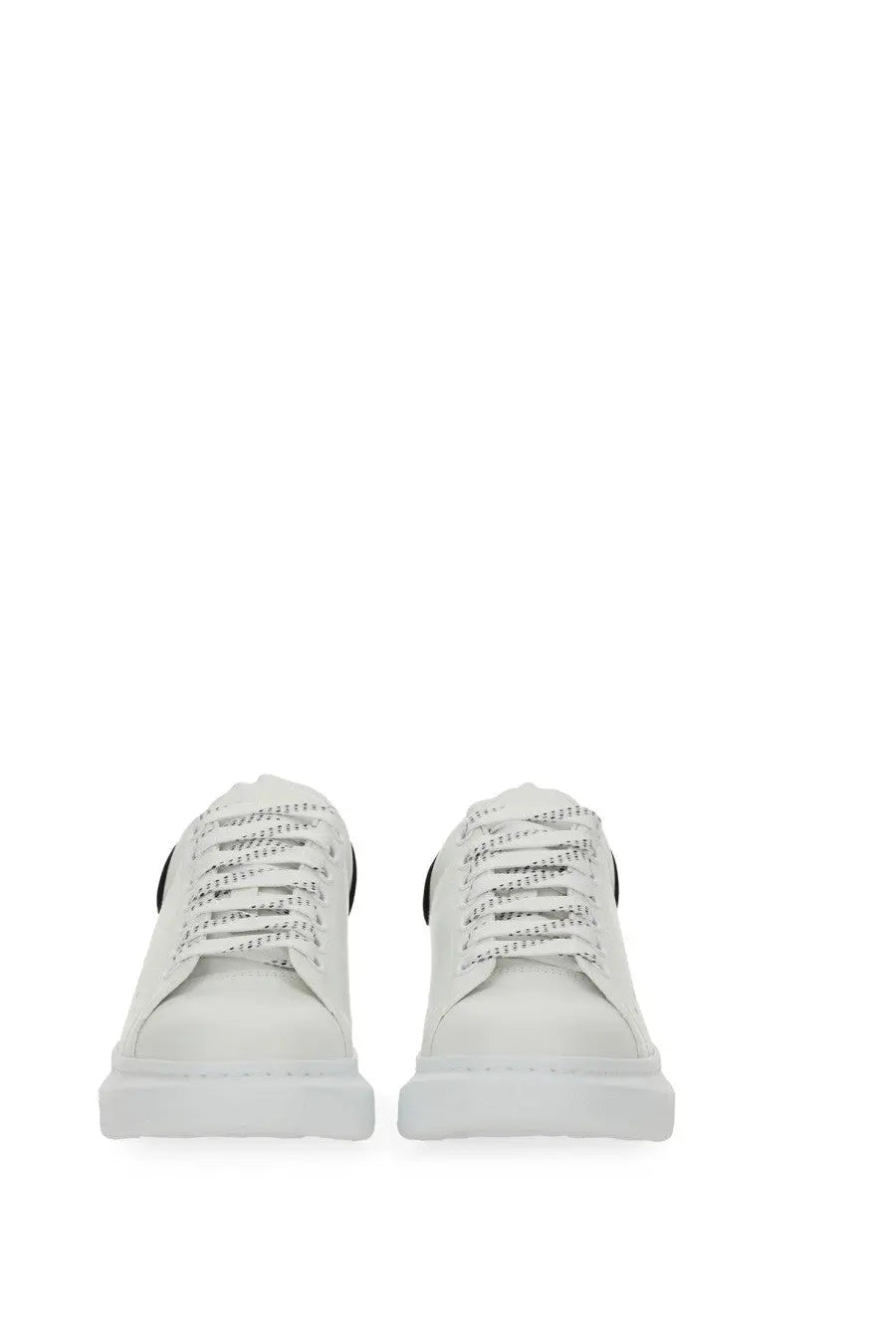 Alexander McQueen women’s oversized sneaker white leather with black accents and chunky sole front view
