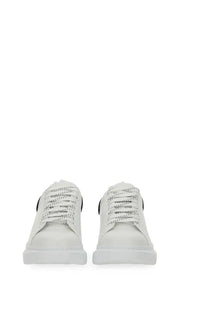 Alexander McQueen women’s oversized sneaker white leather with black accents and chunky sole front view