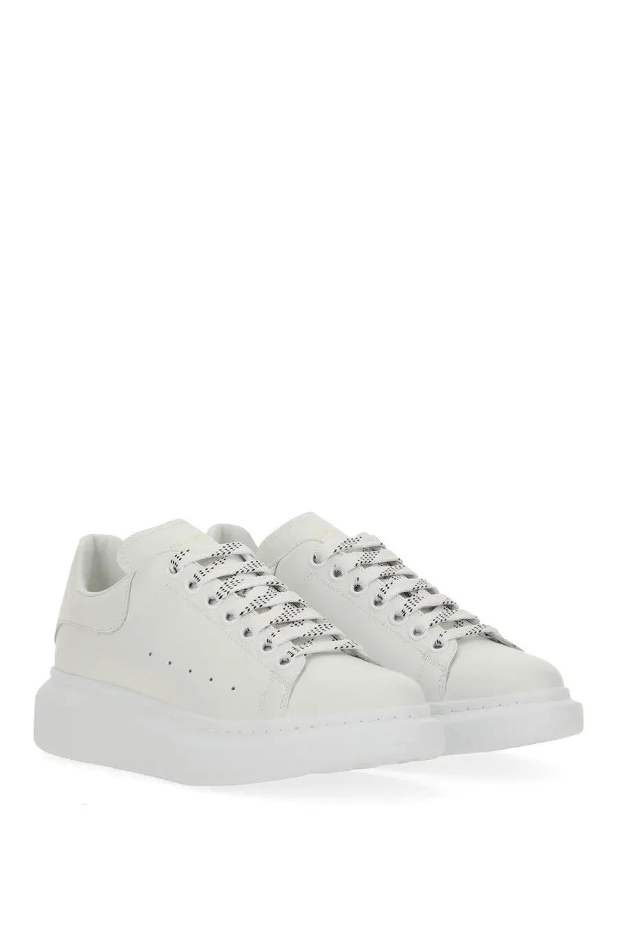 Alexander McQueen women’s oversized sneaker white leather with chunky sole and patterned laces front view