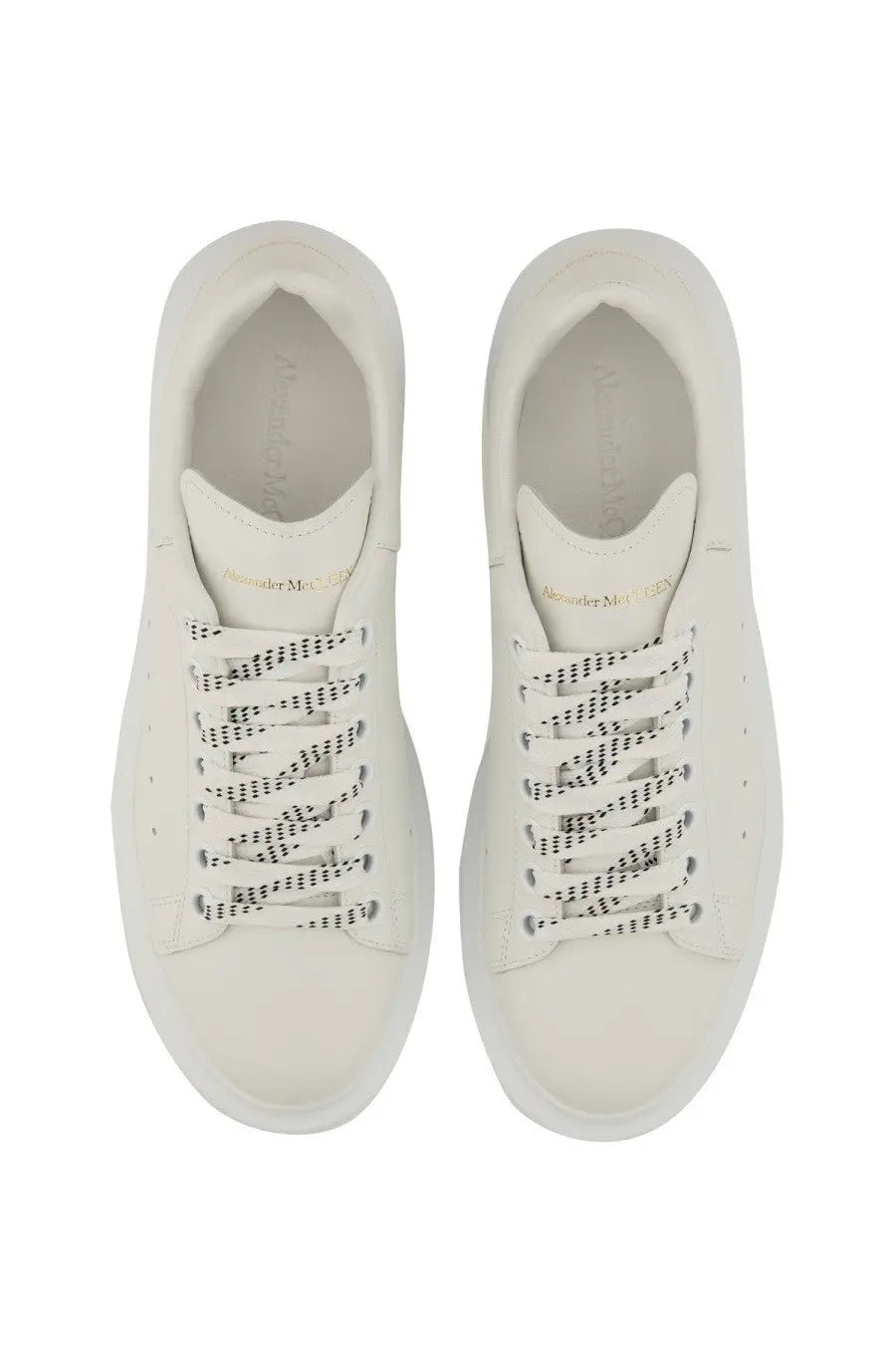 Alexander McQueen women’s oversized sneaker white with black dotted laces and chunky sole in leather material