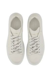 Alexander McQueen women’s oversized sneaker white with black dotted laces and chunky sole in leather material