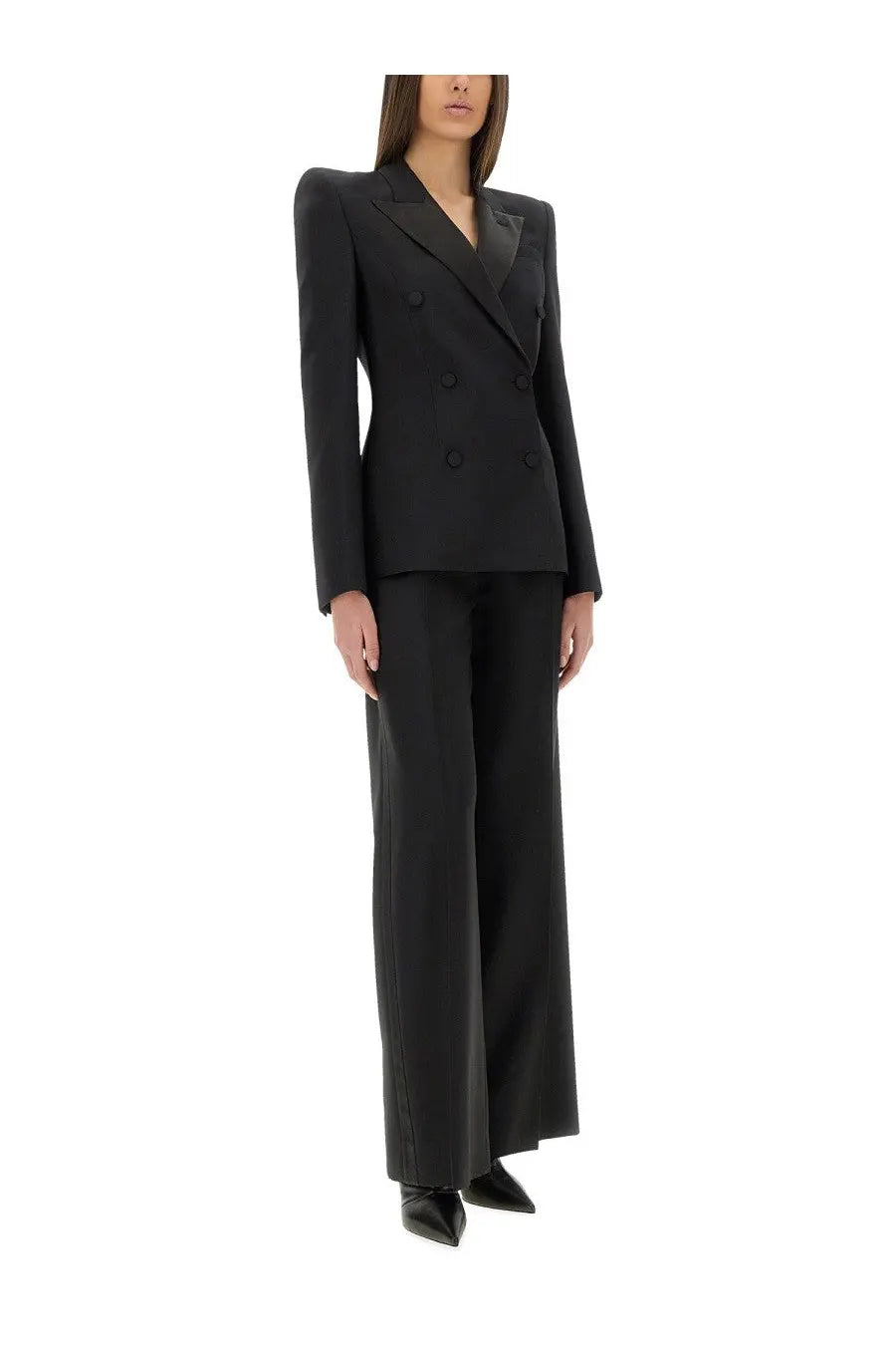 Black double-breasted blazer with structured shoulders and tailored fit paired with alexander mcqueen women’s black pants