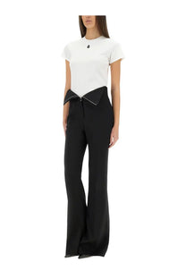 Black wide-leg trousers with bow detail at the waist complementing alexander mcqueen women’s white shirt