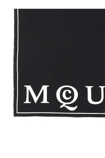 Alexander McQueen women’s black silk scarf with bold white mau logo and matching border