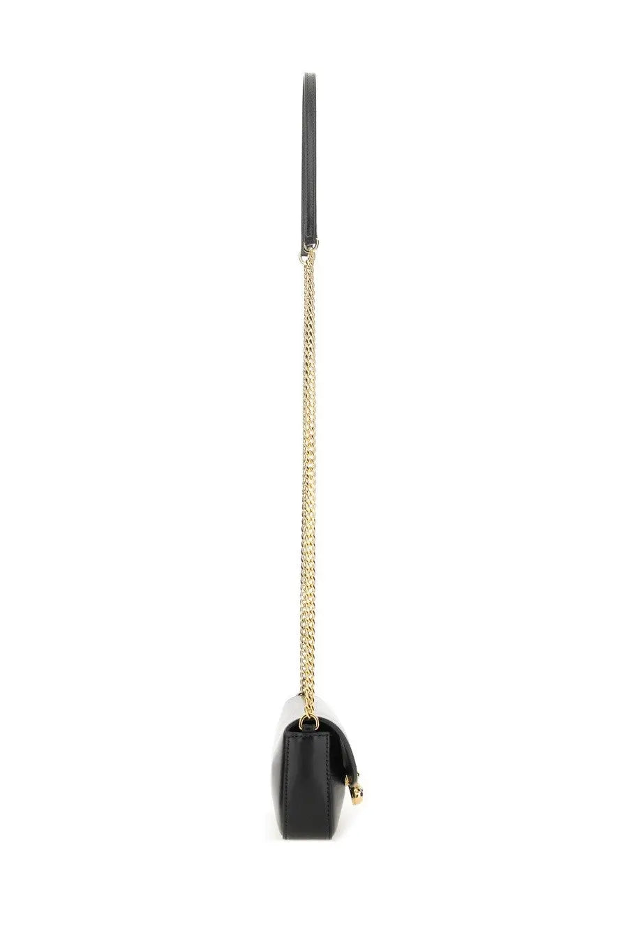 Alexander McQueen women’s small black leather skull flower bag with gold-tone chain strap and matching hardware