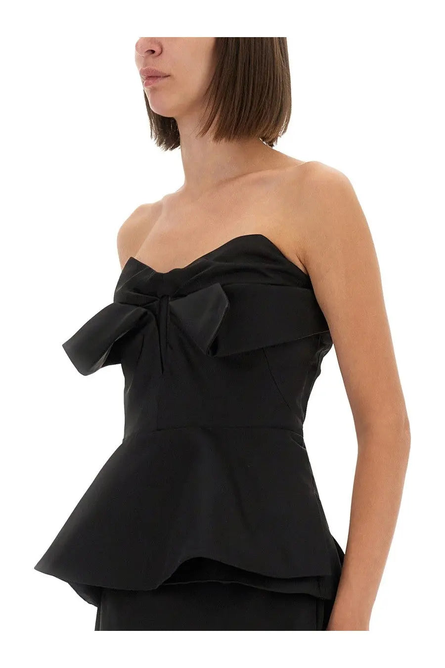 Black satin strapless peplum corset top with large bow at bust by Alexander McQueen for women