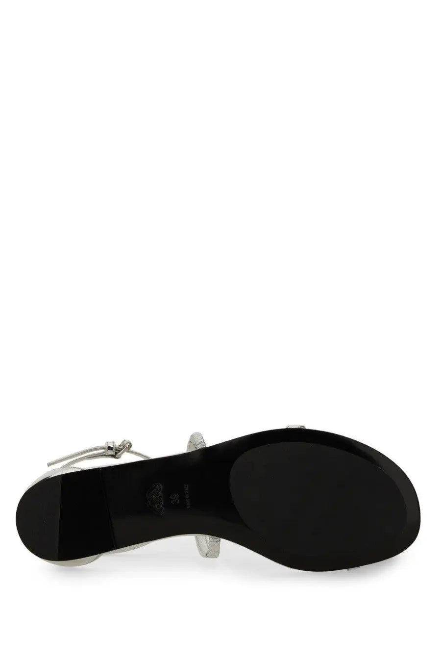 Alexander mcqueen women’s strappy sandal in silver metallic with a black rubber sole and adjustable straps