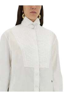 Alexander McQueen women’s white tuxedo shirt with pleated front panels and silver-toned buckle collar detail