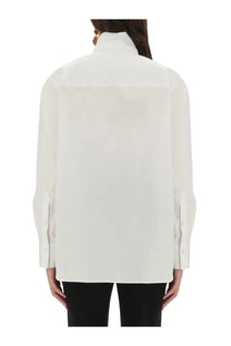 Alexander McQueen women’s tuxedo shirt white with long sleeves structured collar and subtle shoulder pleats