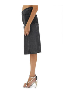 Dark gray two tone denim skirt by Alexander McQueen with frayed hem and classic pocket design in black