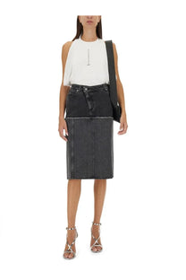 Alexander McQueen women’s black two tone denim skirt with high-waisted mid-length cut and visible stitching details