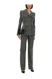 Gray houndstooth wool blazer with structured shoulders and flap pockets paired with alexander mcqueen women’s grey wool pants