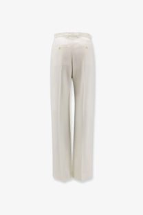 Alexander mcqueen women’s wool trousers in cream with wide legs tailored fit and subtle front pleats