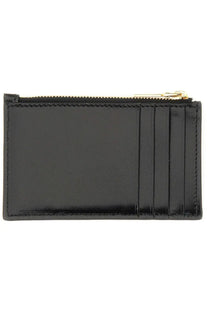 Alexander McQueen women’s black patent leather card holder with gold-tone zipper and stitched vertical slots